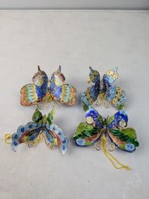A Collection of Four Cloisonn? Enamel Butterfly Ornaments