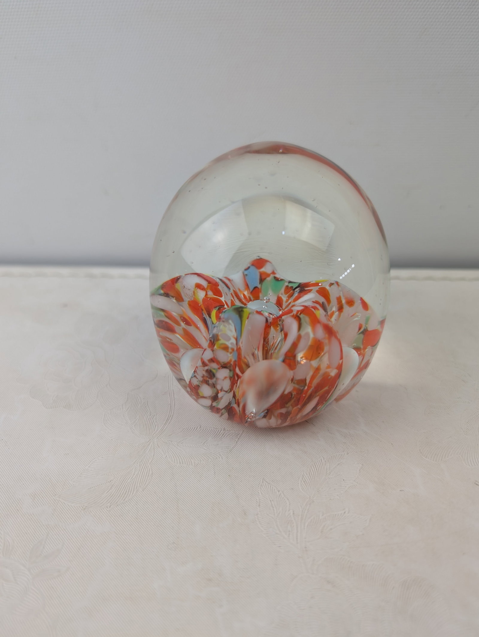 Vintage SASCO Japan Art Glass Paperweight, Multi-Colored Floral Abstract: A Vintage SASCO Japan Art Glass Paperweight. This spherical glass paperweight features an intricate internal design of multi-colored glass fragments, predominantly in vibrant shades of red, orange, ye