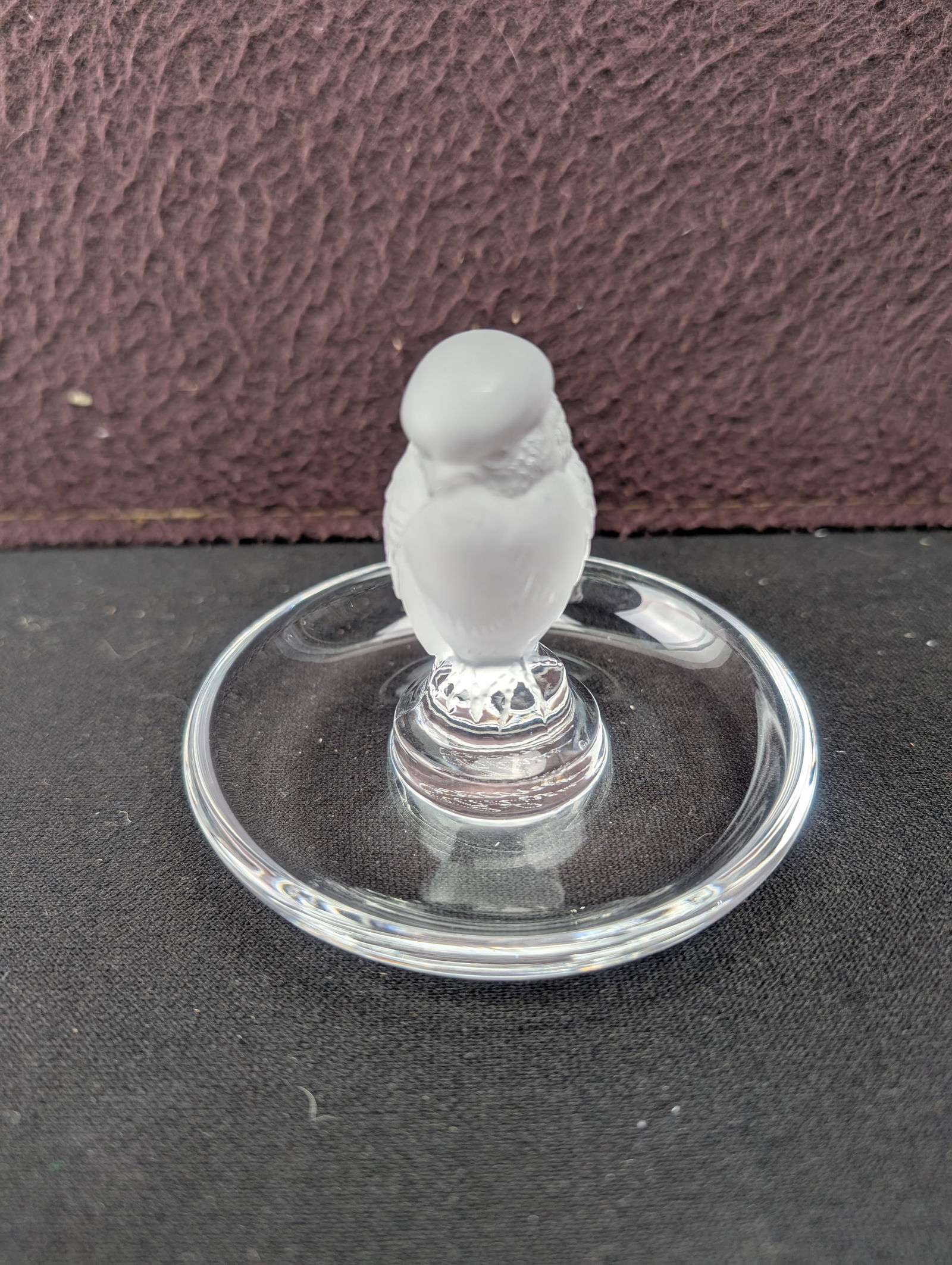 Lalique France Crystal Owl Pin Tray #10710: A genuine Lalique France crystal owl pin tray, also commonly utilized as a ring holder or trinket dish. This elegant piece features a stylized owl figure crafted from frosted (satin) crystal, perched