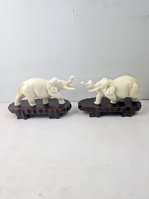 A Pair of Faux-Ivory Elephant Figurines on Carved Wooden Bases, Made in Taiwan