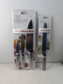 A Lot of Two KitchenAid Factory-Sealed Knife Sets: 3-Piece Chef/Utility/Paring (KKS53SSST) and 8"