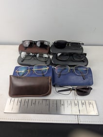 A Lot of Used Prescription Glasses and Sunglasses by Chesterfield, TitanFlex, Blueprint, Cobra, and
