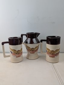 A Lot of 1976 McCoy 'Spirit of '76 Carved Wooden Eagle' Ceramic Pitcher and Two Mugs