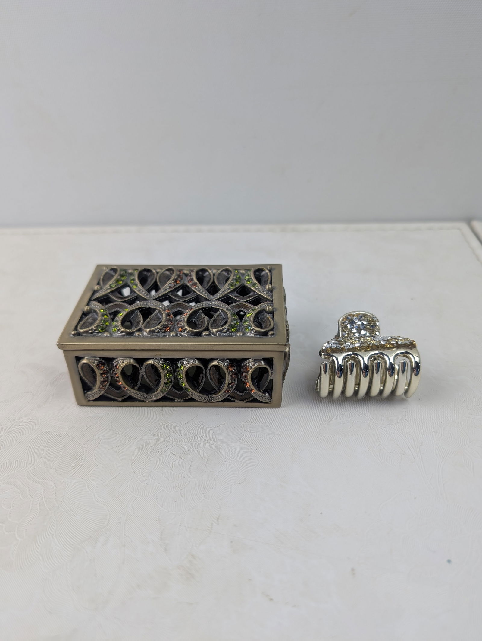Decorative metal trinket or jewelry box with openwork design and colored rhinestones, paired with a (1 of 10)