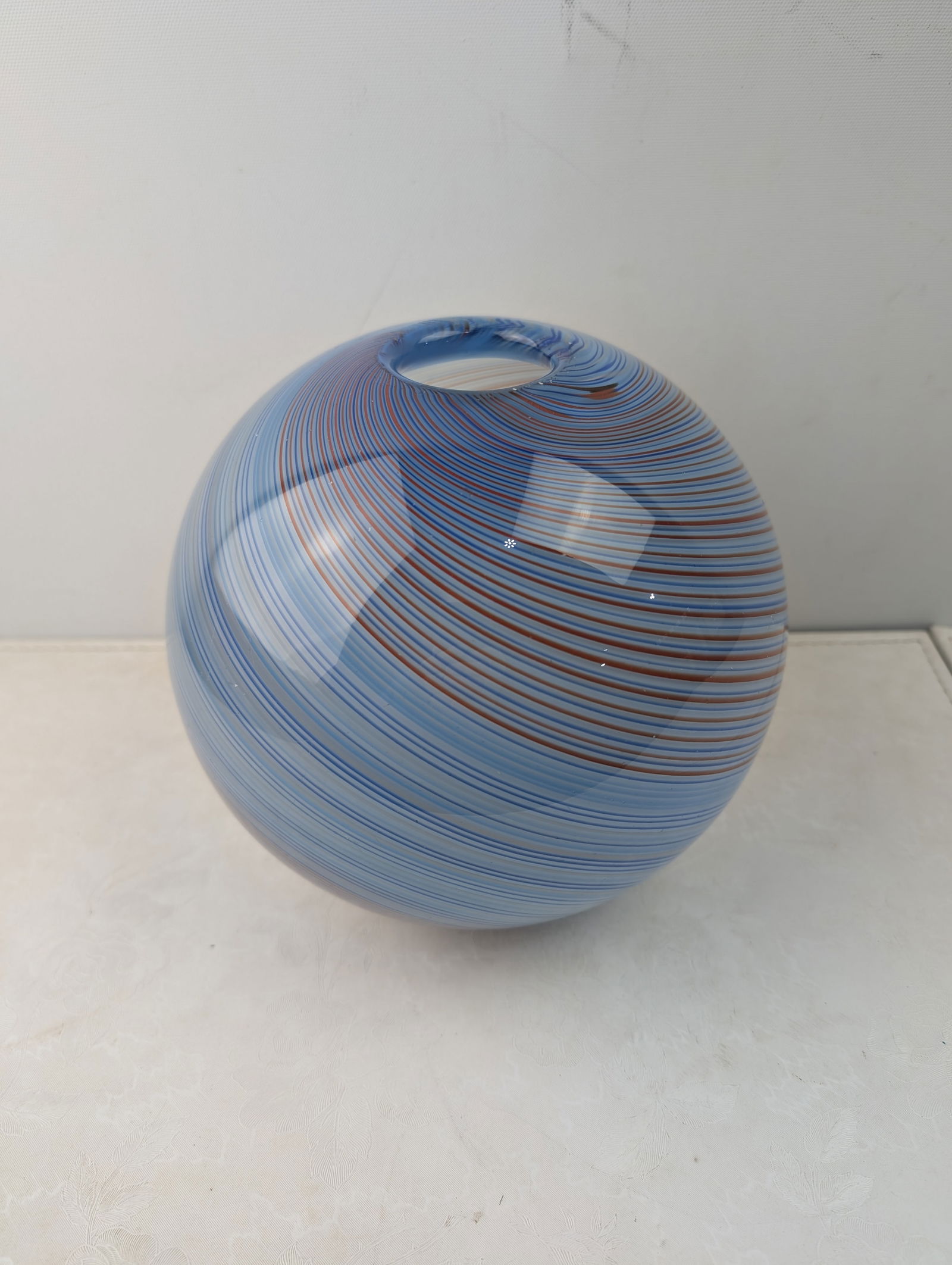 Hand-blown art glass spherical vase with blue and amber spiral line decoration. Rounded globe form (1 of 7)