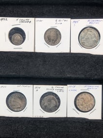 Six Silver Foreign Coins.