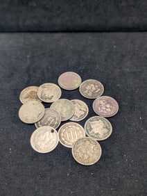 Thirteen Mixed Date Cull 3-Cent Nickels.
