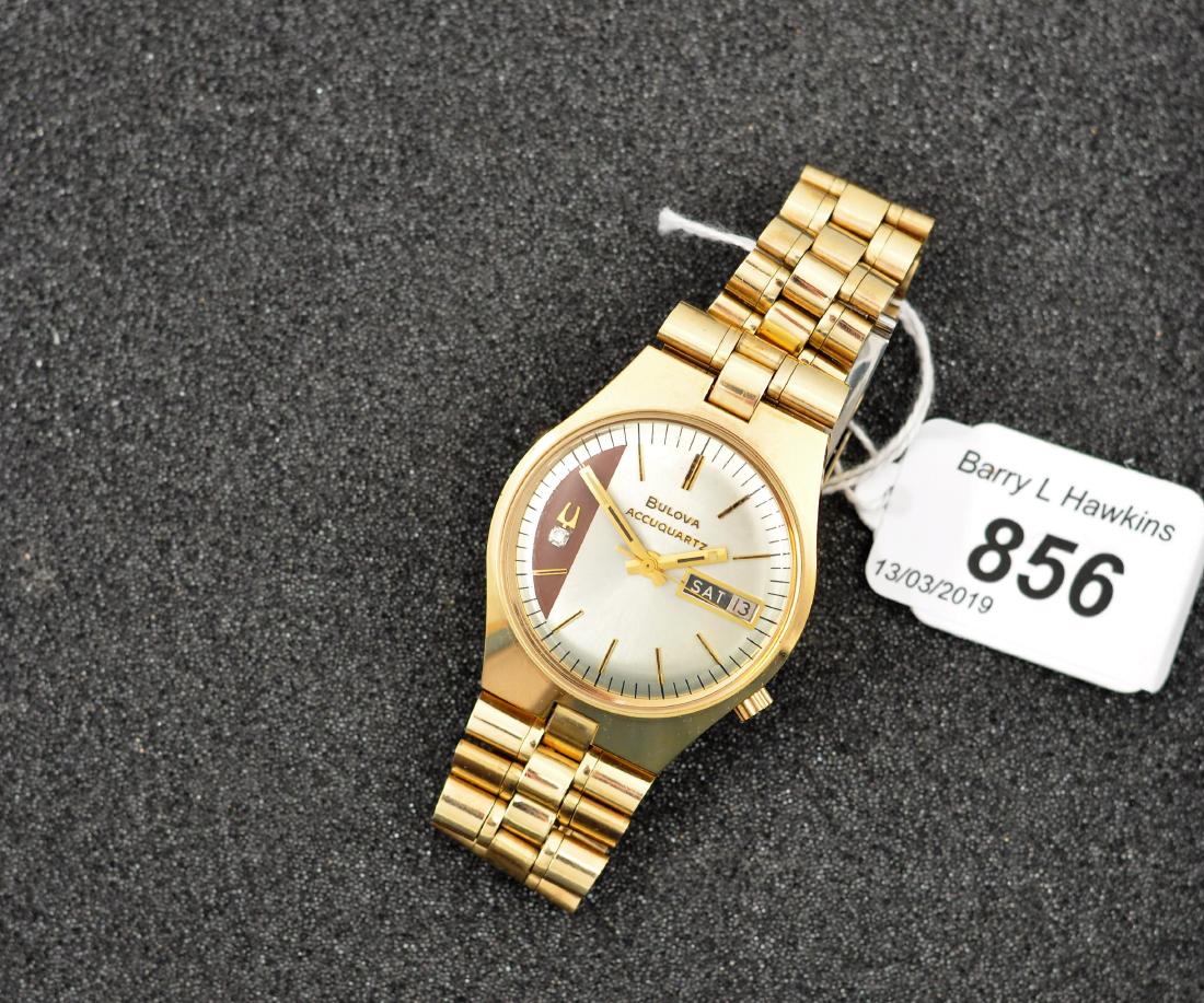 BULOVA ACCIS QUARTZ GOLD COLOURED CASE AND METAL STRAP: BULOVA ACCIS QUARTZ GOLD COLOURED CASE AND METAL STRAP DATE APERTURE