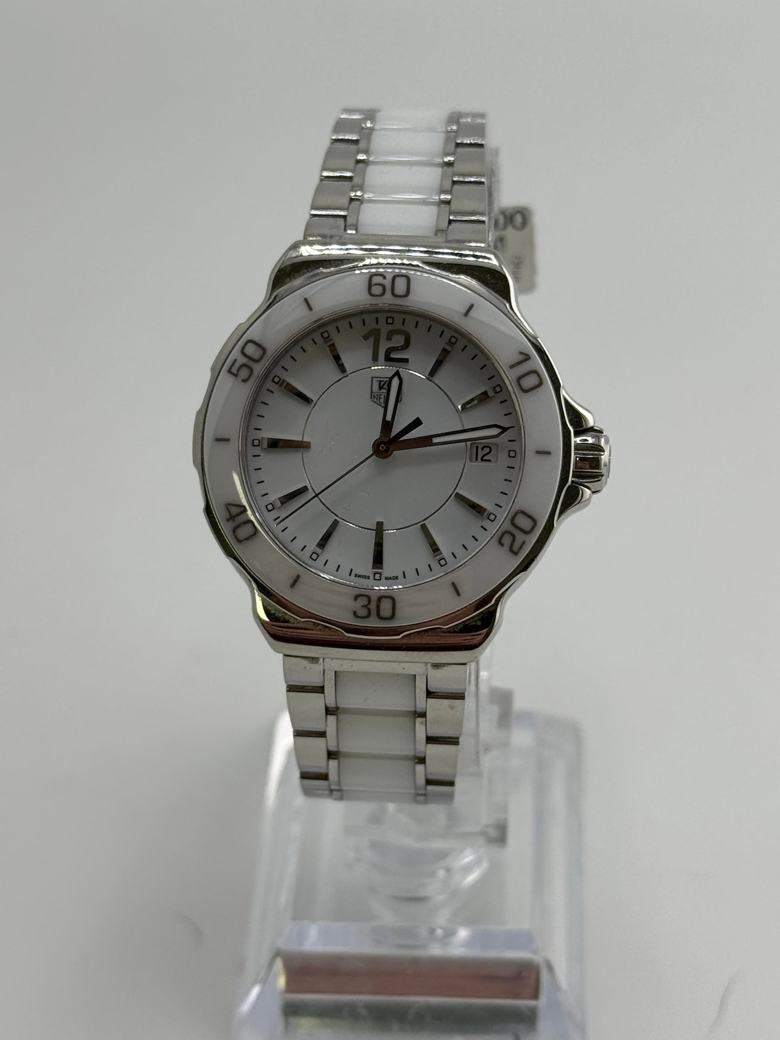 Tag Heuer Ladies WAH1211: Tag Heuer Ladies WAH1211, with box and papers, working at the time of catalogue The working order, accuracy or any implied water resistance of any lots sold is not guaranteed. For more information