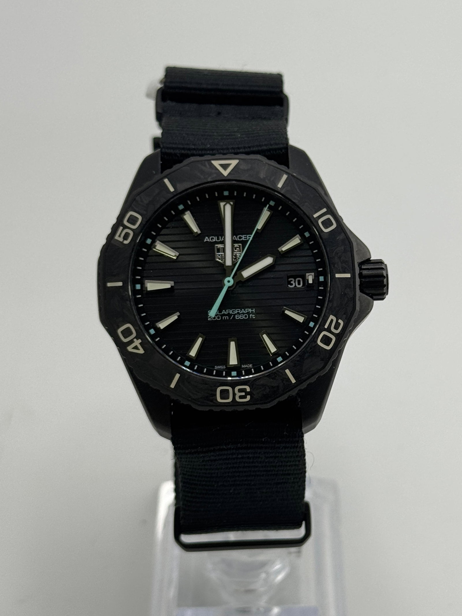 Tag Heuer Aquaracer Solargraph: Tag Heuer Aquaracer Solargraph, with box and papers, working at the time of catalogue The working order, accuracy or any implied water resistance of any lots sold is not guaranteed. For more informati