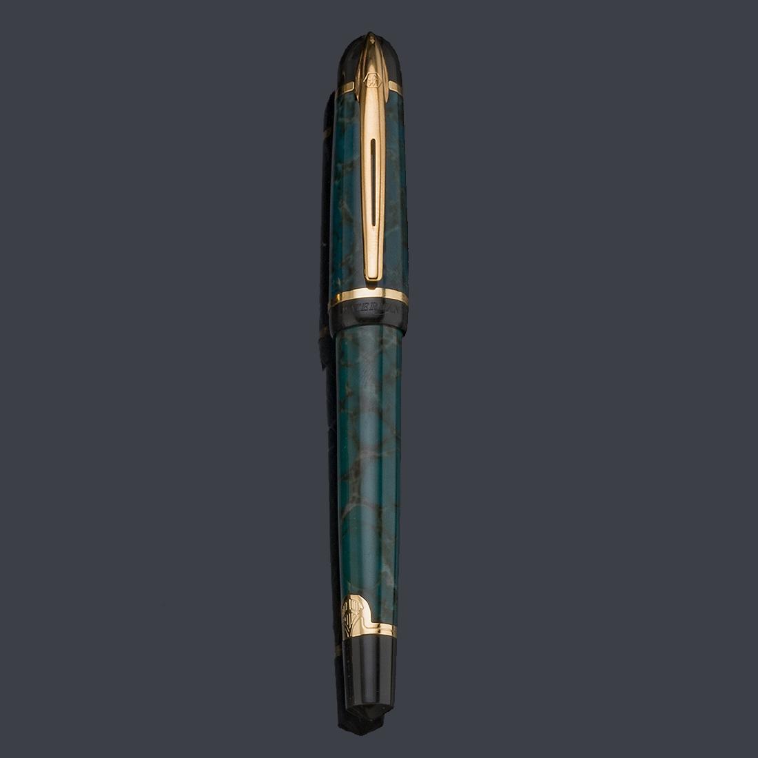 WATERMAN, Paris.: WATERMAN, Paris. Body and cap in green marbled resin. Original nib. Cartridge system. In working order.