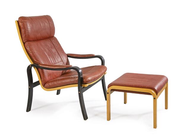 - Ingrid Easy Chair Armchair made by BRUNO MATHSSON for: With Cognac color leather and footrest. In black lacquered beech wood.Size 100 x 48 x 67 and 38 x 48 x 55 cm