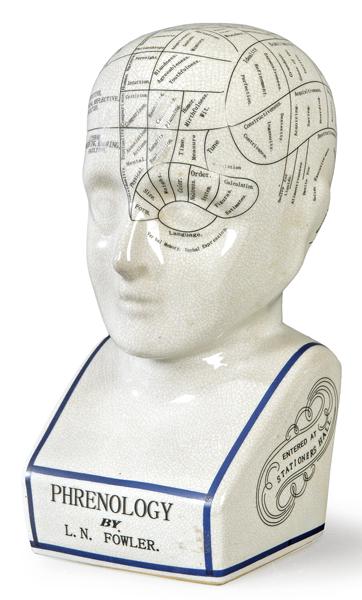 Glazed porcelain phrenological head with inscription by: Glazed porcelain phrenological head with inscription by Lorenzo Niles Fowler (1811-1896) showing 42 phrenological organs and their names on one side and their seven collective groupings on the other.