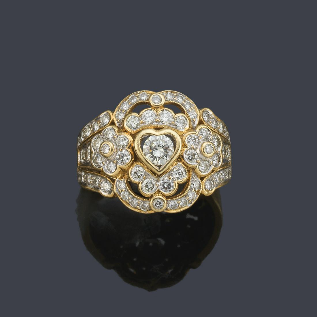Ring with a floral motif front and a heart-shaped (1 of 1)