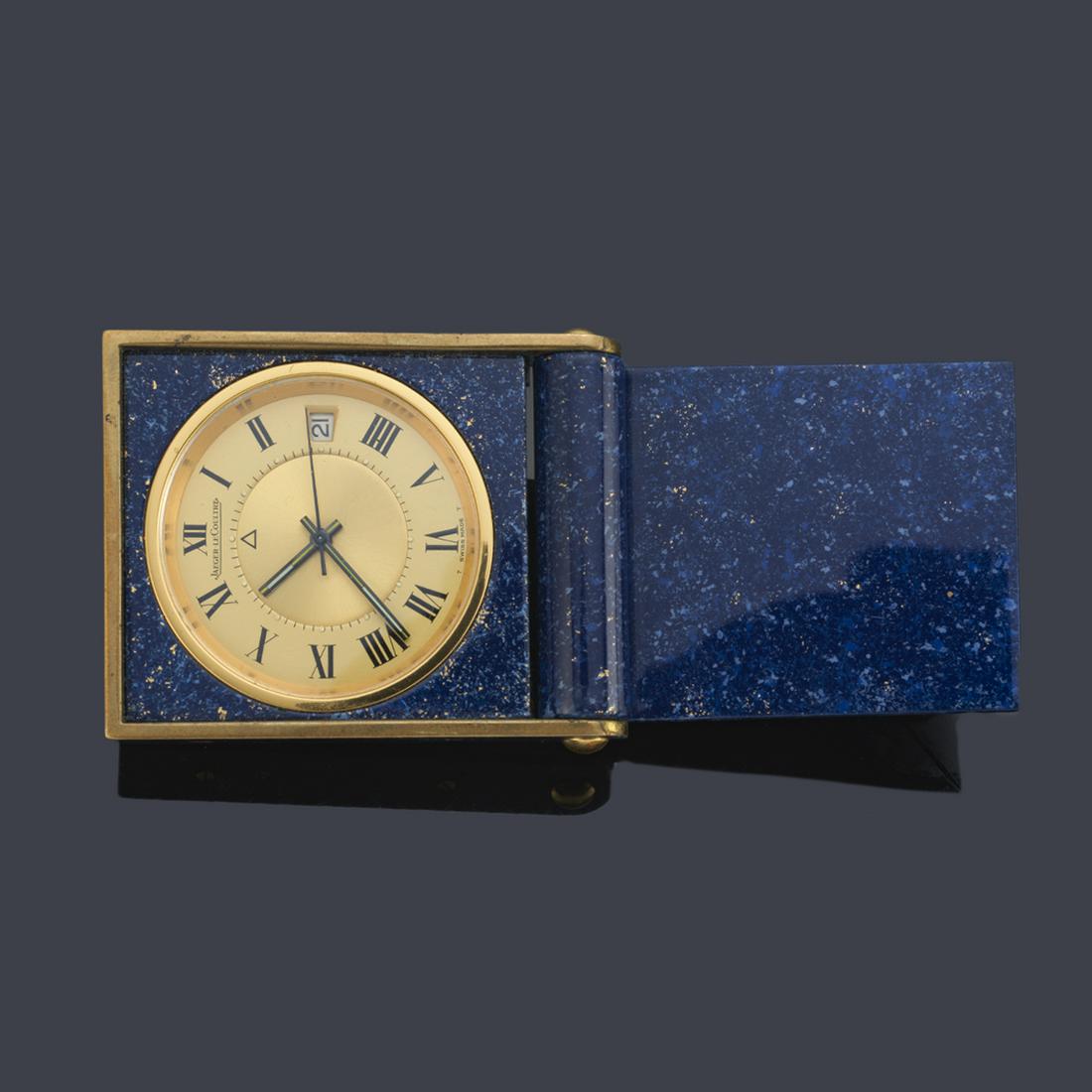 JAEGER LE COULTRE, gold and enamel travel alarm clock: JAEGER LE COULTRE, gold and enamel travel alarm clock simulating lapis lazuli. Golden dial with Roman numerals, luminescent hands, second in the center. Rope mechanism.
