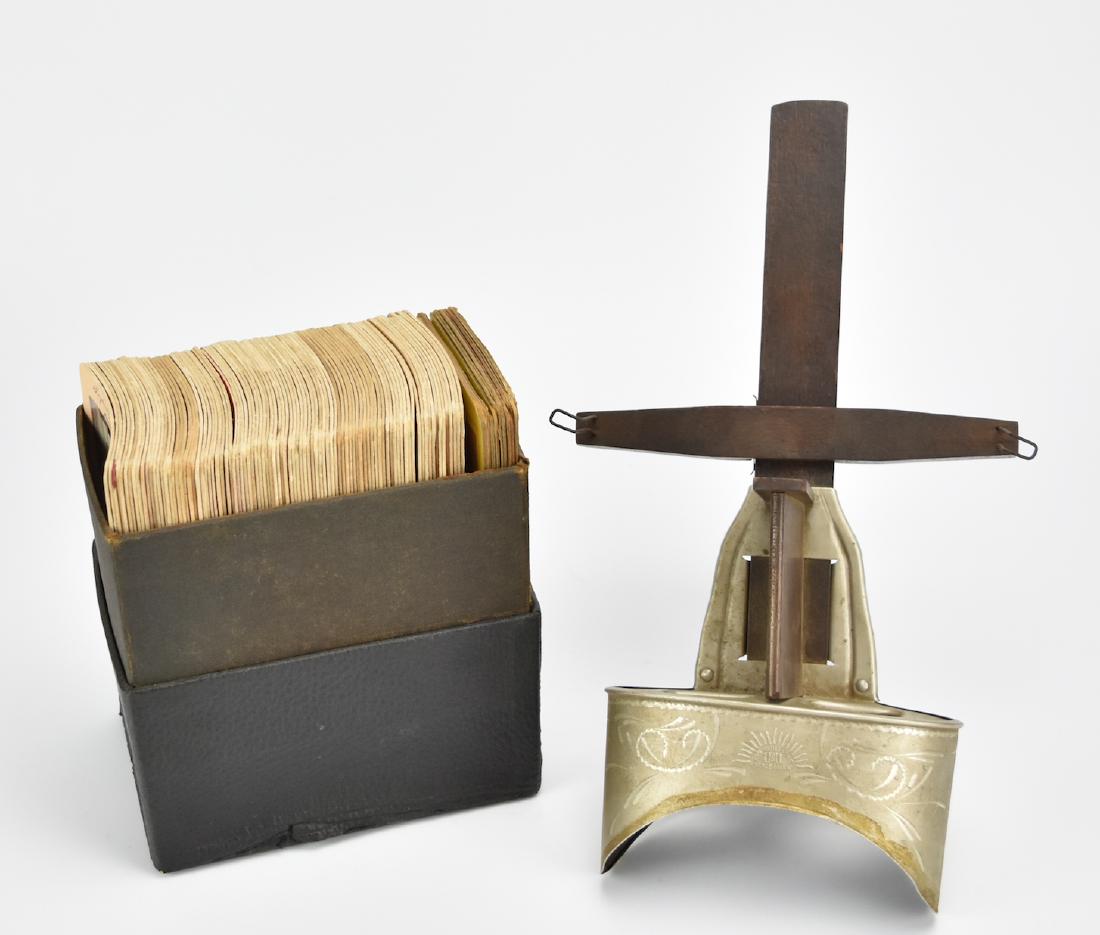 Holmes Stereoscope w/ 90+ Stereocards 1860-1930: A Holmes stereoscope of wood and tin manufactured by: Sun Sculpture U&U between 1861 and 1930 with approximately 95 stereocards (the majority produced by the Keystone View Company circa 1900). The ste