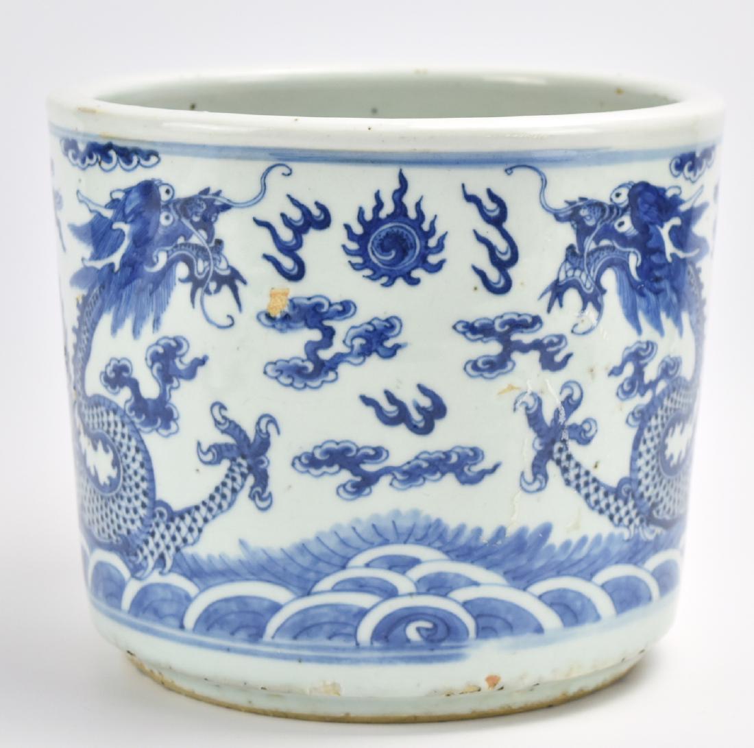 Large Chinese Blue & White Dragon Censer, 18th C.: large Chinese blue and white censer with two dragons facing to each other amongst auspicious cloud and ocean wave underneath there is inscribe underside in black ink indicated that this censer was bel