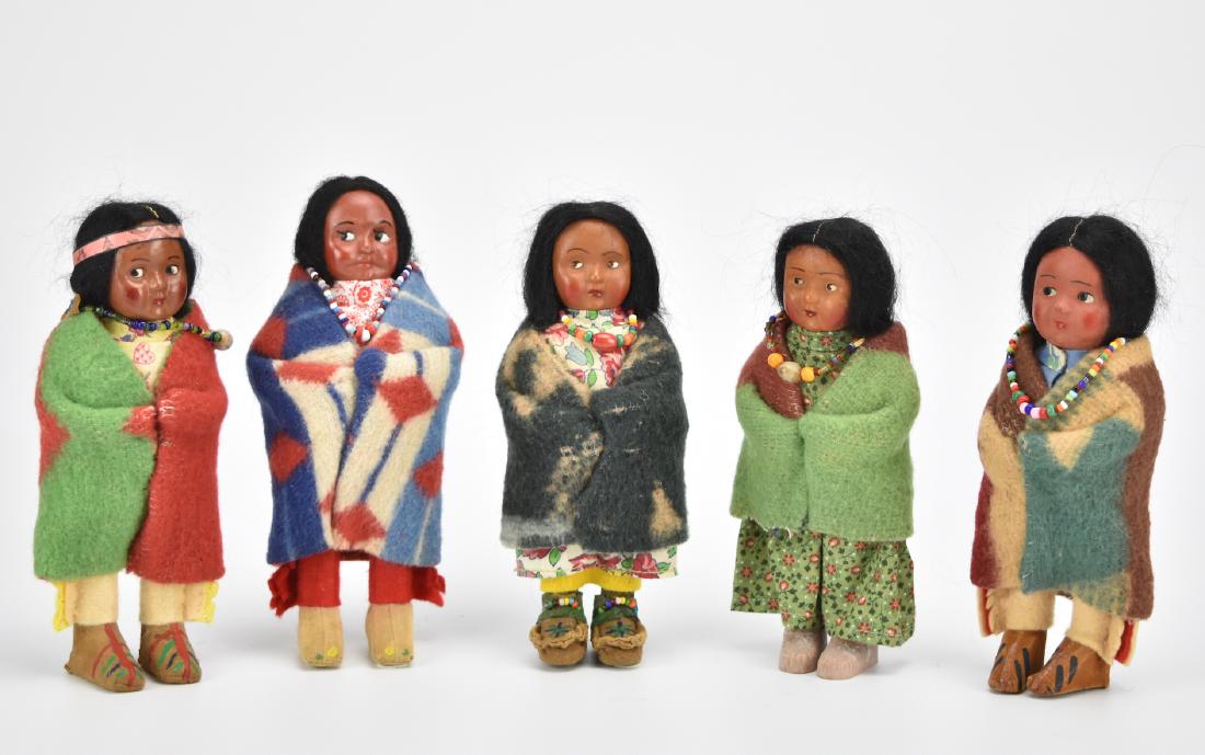 Group of 5 Indian Skookum Dolls: A group of 5 Skookum dolls, original clothes, beads, condition H: 6" Provenance: estate from a Cedar Grove ,NJ collector