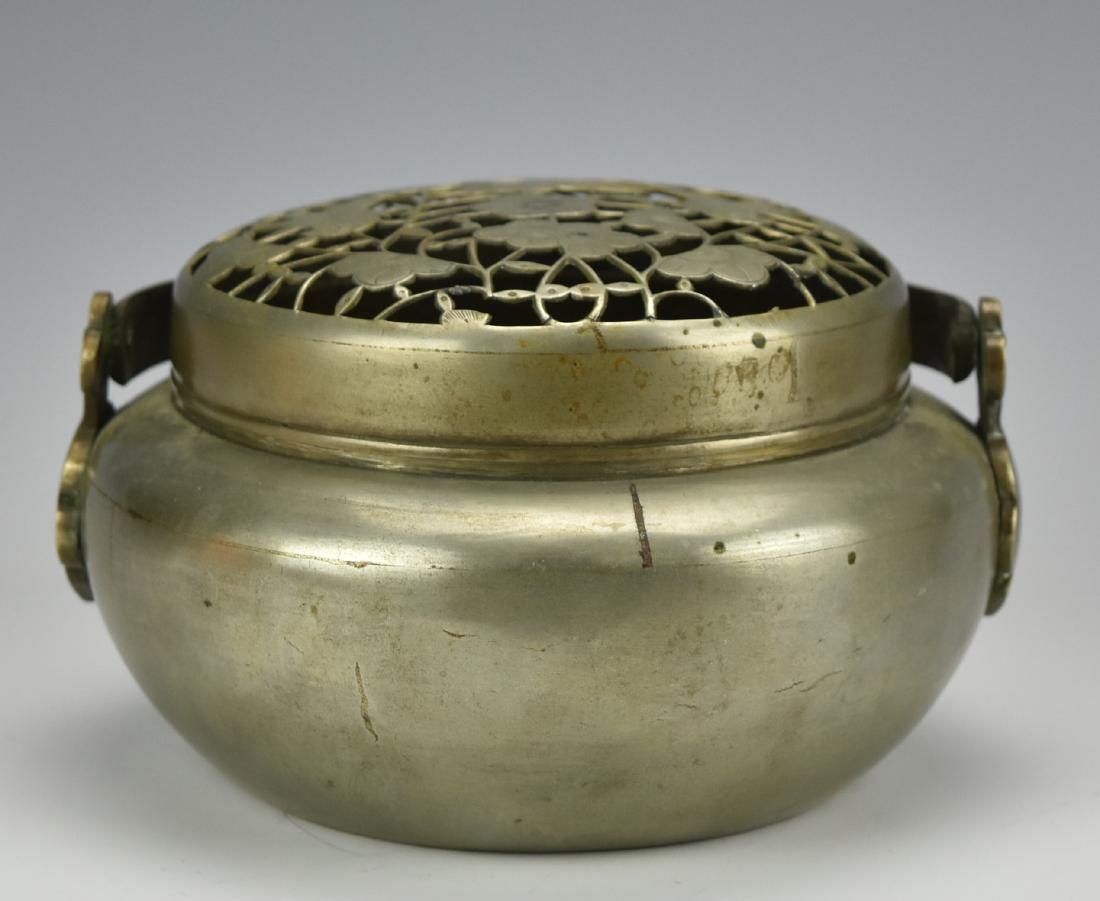 A White Bronze Hand Warmer, Qing Dynasty (1 of 7)