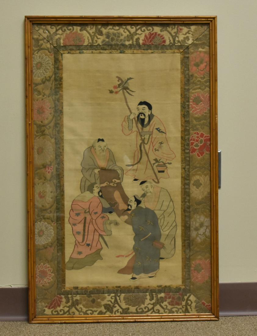 Chinese Framed Silk Kesi Embroidery of Scholars: A large, antique, Chinese, silk embroidery of five bearded scholarly gentlemen admiring a painted scroll, matted with three bands of patterned embroidered silk in a wooden frame styled as 3-tiers of b