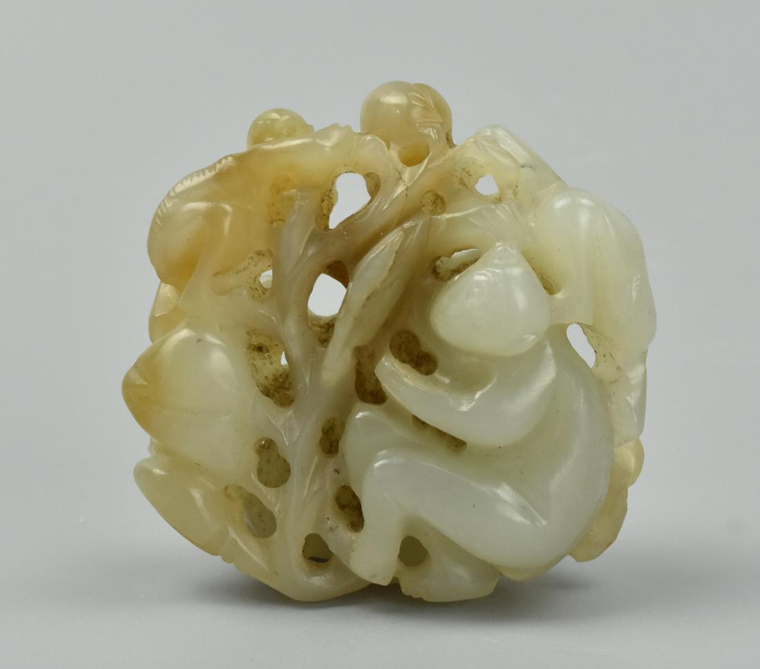 Chinese Jade "Monkeys on Monkeys" Pendant, Qing D: A white & brown carved jade pendant, circular, showing monkeys climbing on monkeys, on top of monkeys upon an open scroll network. D: 1 3/4" (4.4cm) Condition: In excellent condition with no sign of d