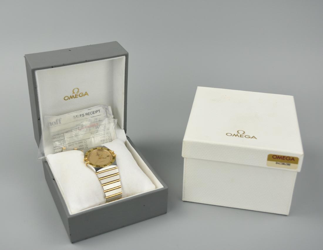 Women Omega Constellation Dail Gold Watch: original Omega Constellation Women watch comes with original box and receipt, with stainless steel and 18K yellow gold case with a two-tone (silver and gold tone) fixed roman numeral 18kt yellow gold 