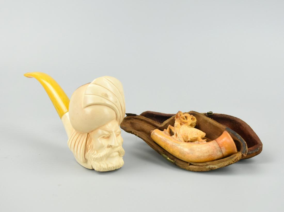 2 Carved Meerschaum Pipe, 19th C.: Unique 2 Tone Straight Stem 40 to 50 Year Old Meerschaum Pipe - intricately hand carved, an antique cigar tip holder comes in its original fitted case. D: 4 3/4"(12.2 cm) Condition: Some age related w