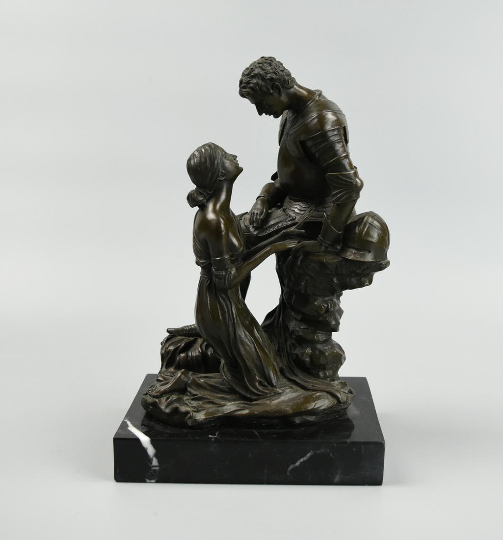 Bronze Sculpture on Black Granite Base, 20th C.: Bronze sculpture/statue with two figurines figure. A man in ancient armored sitting down and a female kneeling. H: 10 5/8" (27cm) Condition: In excellent condition with no damage observed