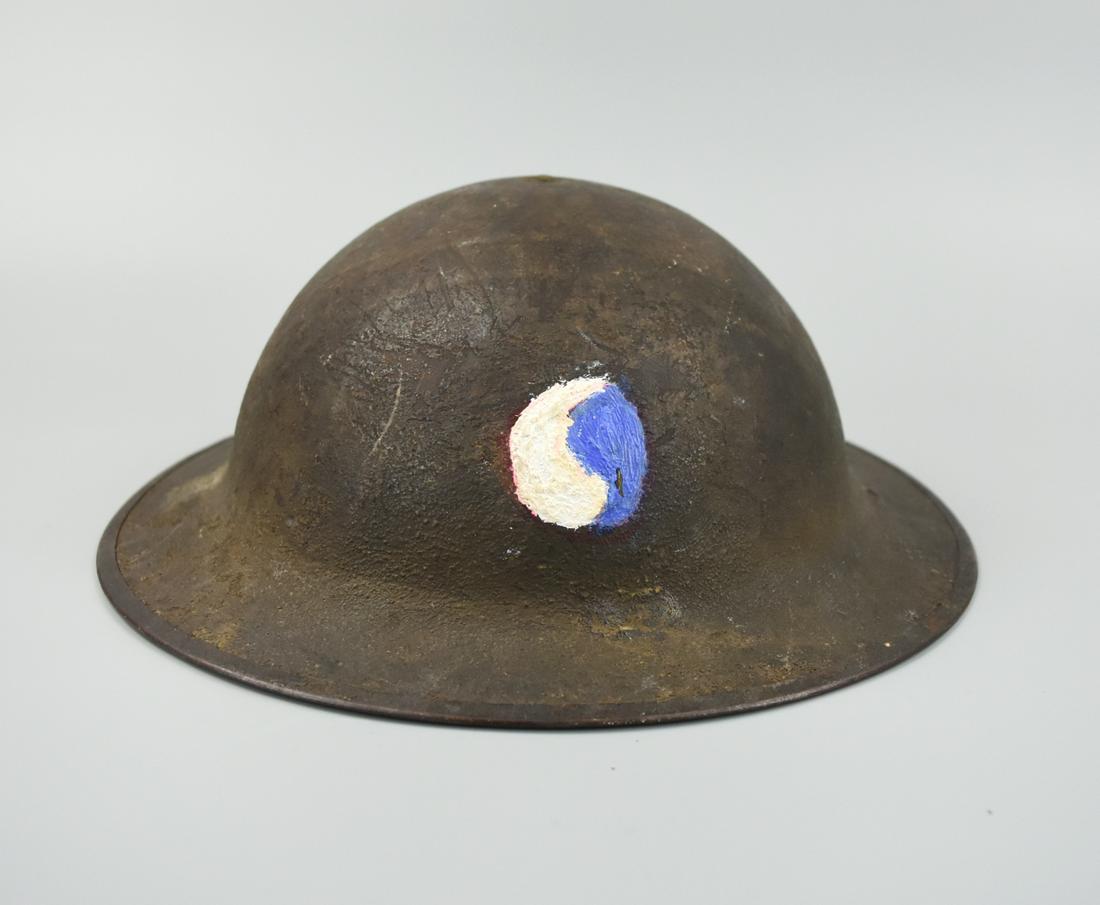 WW2 Iron Military Helmet: This helmet has been designed as a tribute to the Infantry Division during WW2. The helmet has had the Infantry Division insignia hand painted on the front of the helmet. This helmet is used by Japan'