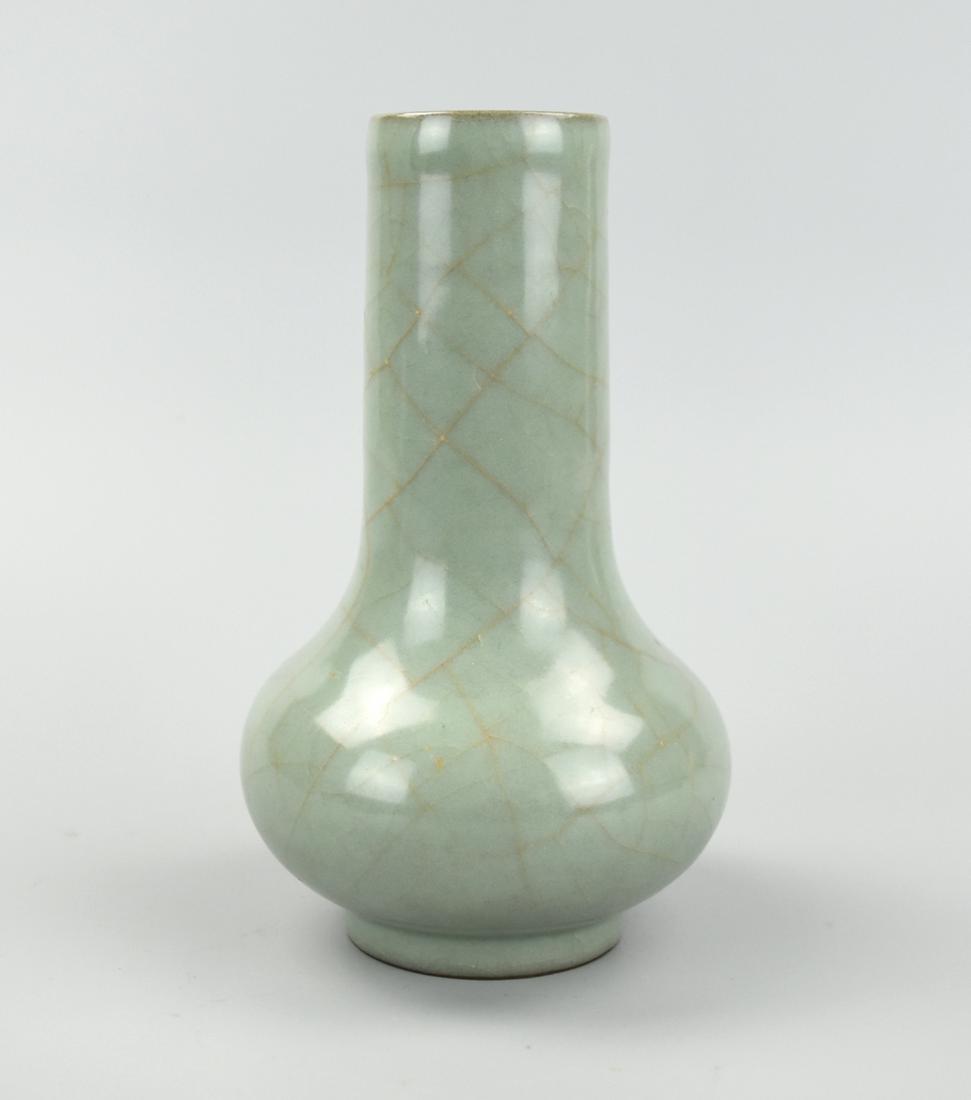 Chinese Song Style Longquan Ware Celadon Vase: A Chinese, porcelain vase of ovid form with a narrowing base & mouth showing a pattern of swirls within concentric diamonds through the Celadon glaze. H: 6 1/4"(16cm) Provenance: Dorothy Tapper Goldma