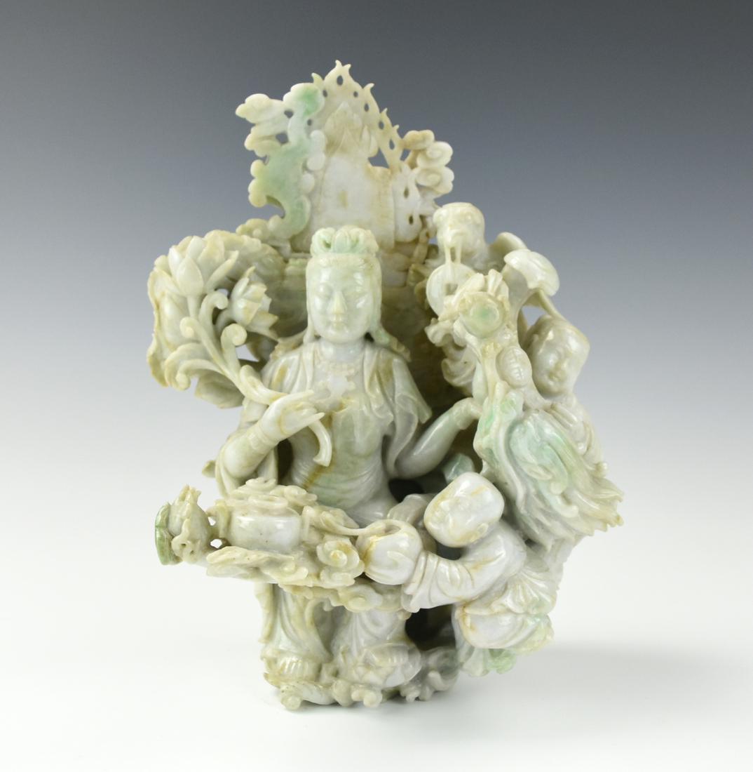 Chinese Jadeite Guanyin and Children Ornaments: Comprising of a jadeite plaque, meticulously carved with a Guan Yin of celadon tone resting on a lotus flower, and carved with two children of matching tone and translucency and a bird with a large be