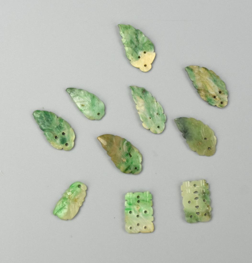 Group of Chinese Jadeite Earing Pieces, Qing D.: group of ,Chinese ,Qing D, small jadeite earring pieces includes: two double happiness form and eight leaf form D: approx 1.8-2.5 cm Condition: in good condition with natural inclusion and fissure,
