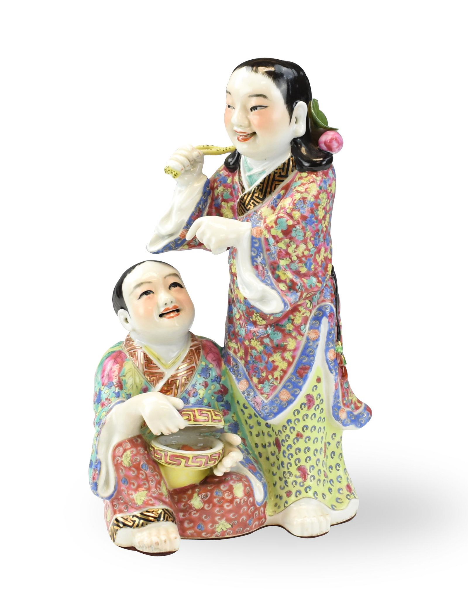 Chinese Famille Rose Figure of "HeHe" Deities: Chinese ,20th C, two porcelain figures decorated in floral patterns , one standing figure holding a lotus leaf with her right hand, the other seating figure holding an opened round box looking upright