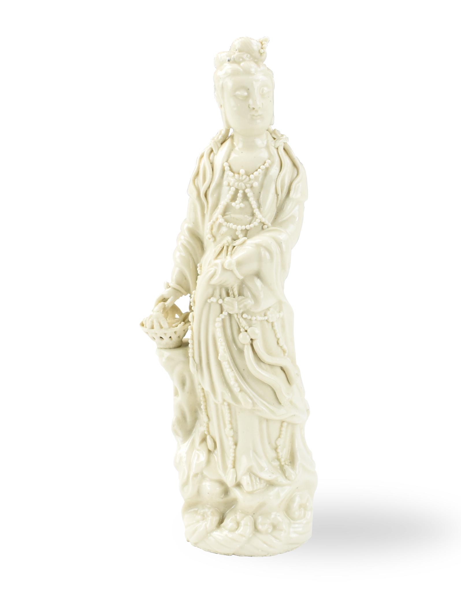 Chinese Dehua Figure of Guanyin, 19th C.: Chinese ,19th C,a dehua figure of guanyin standing on a ocean wave holding a basket to one side, with long robes and chains of beads decorated to the body H: 10"(25.5cm) Condition: in good condition, 