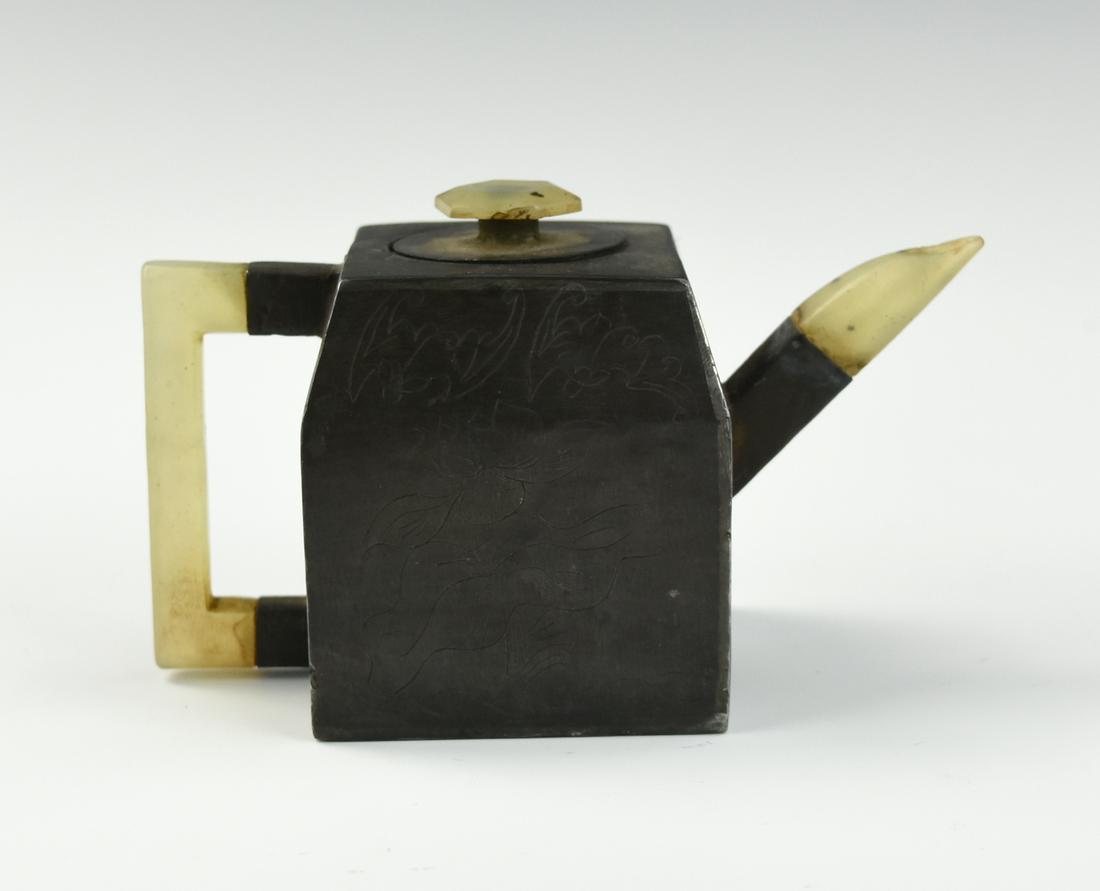 Chinese Pewter Teapot w/ Zisha & Jade,Qing Dynasty: Chinese ,late Qing Dynasty ,the teapot and cover of rectangular form, incised with an old figure on one side and flowering plants on the other, with jade handle, finial and spout, zisha to the inner w