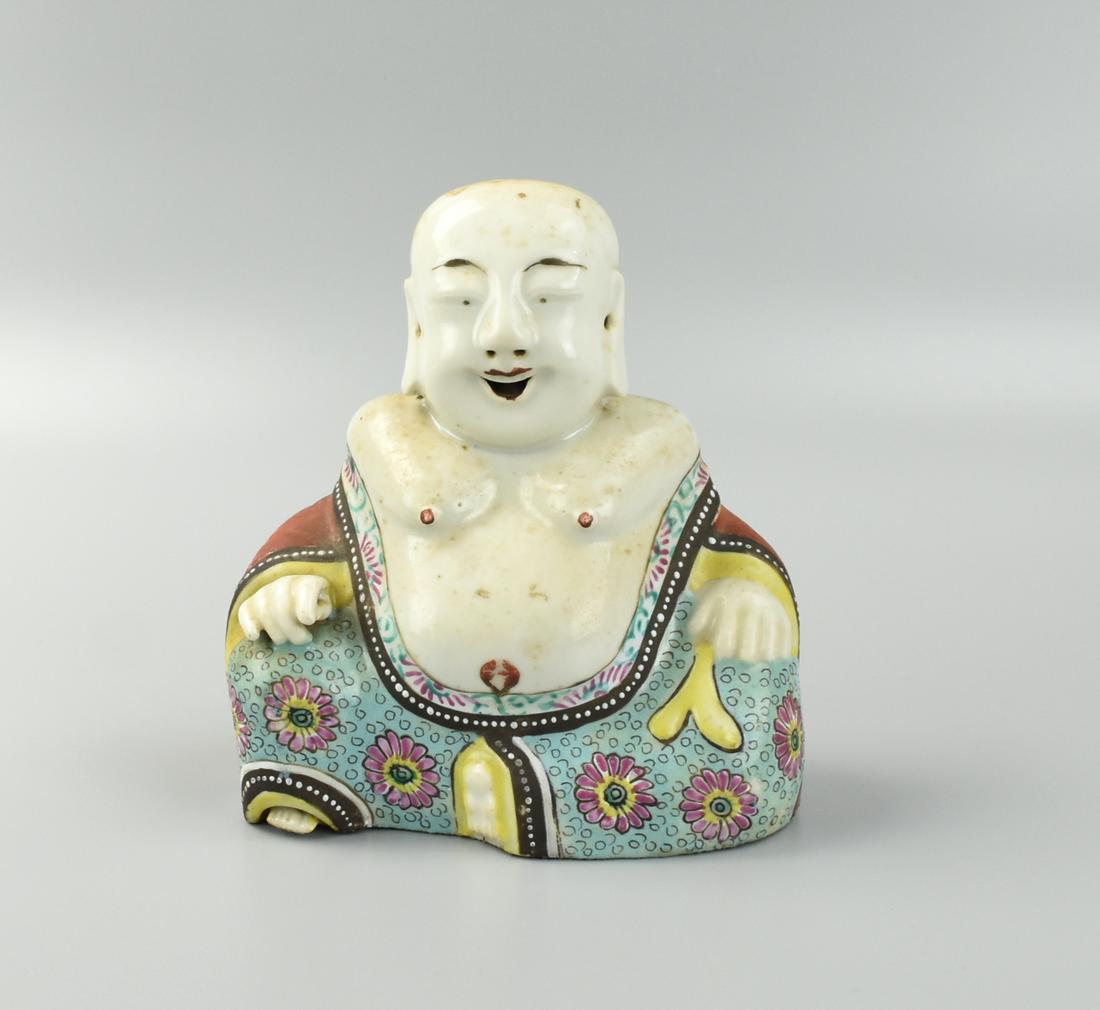Chinese Famille Rose Porcelain Budhha Figural: A Chinese ,19th C,porcelain figure of buddha, with revealed chest, seated with two hands place on his knees, opened mouth, mirthful expression, decorated with colorful robs on a hollow base. Condition