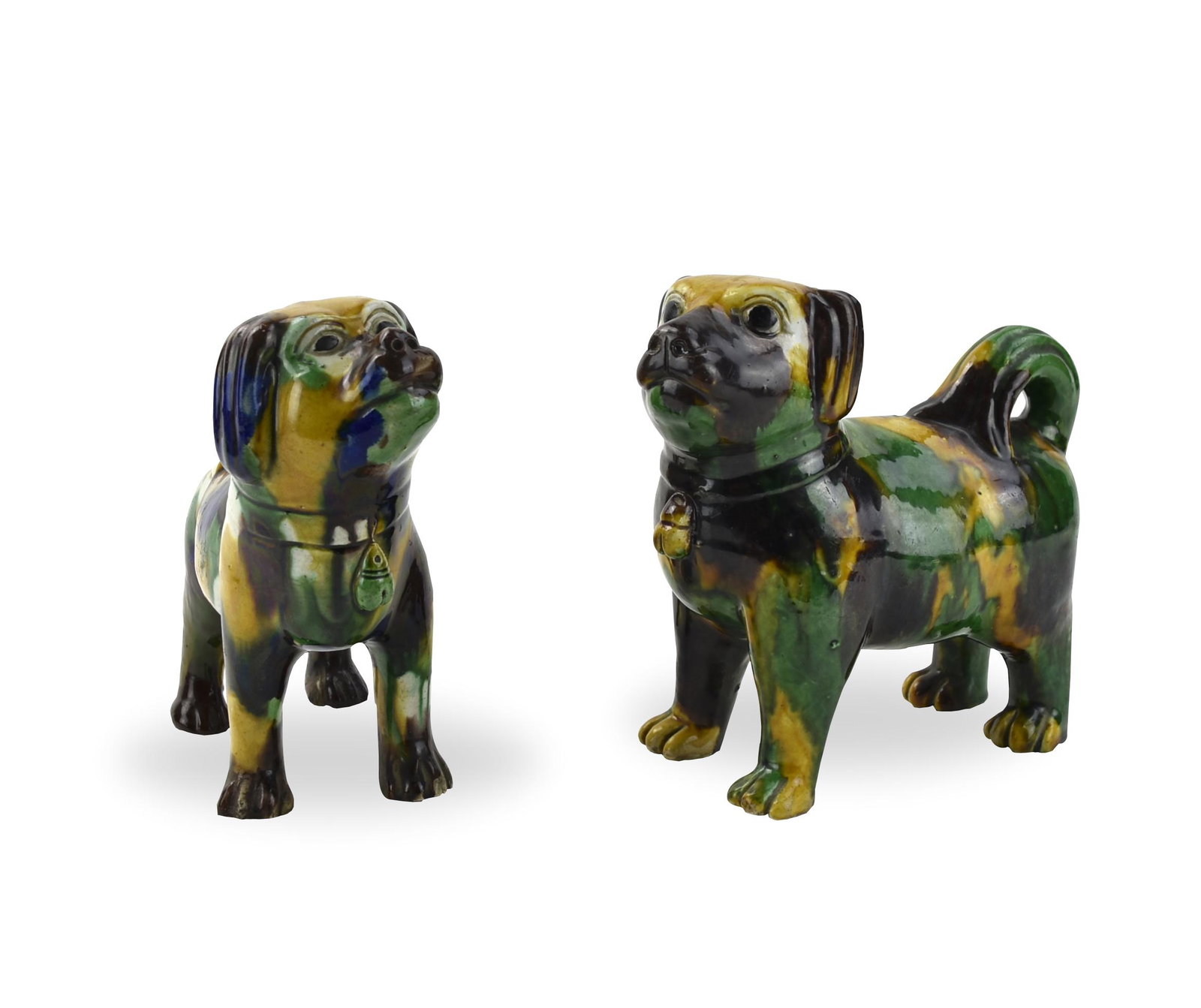 Pair of Chinese Sancai Glazed Dog Figure, 18th C.: Chinese ,Late Qing D, a pair of sancai glazed foo dog enameled in green, brown and yellow H: 6.7"(17cm) D: 3.5"(9cm) Collection of Mr. Walter Baker, Philadelphia ,PA Condition: one is in good conditio