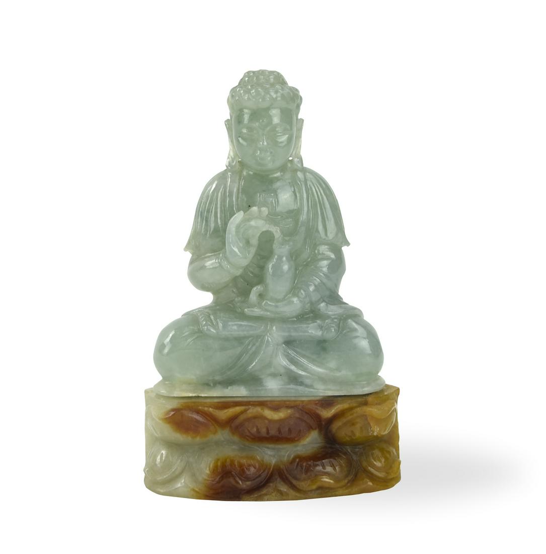 Chinese Jadeite Figure of Guanyin: the figure seated in dhyanasana on a double-lotus, his hands in dharmachakramudra, with serene facial expression framed by pendulous ears with both hands holding a vase H: 3.7"(9.3cm) D: 2.5"(6.3cm) C