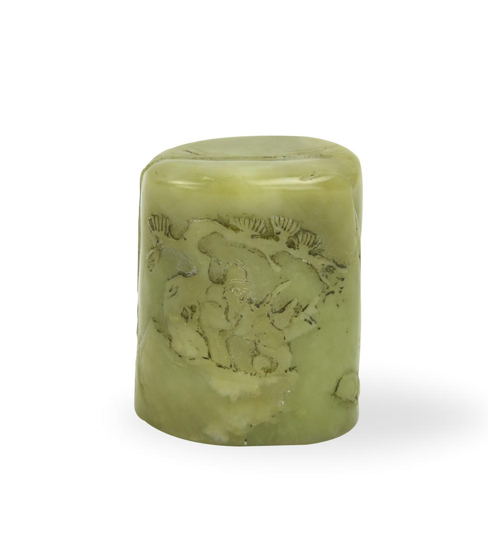 Chinese Green Jade Seal: a green jade seal, carved with figural, rock work and pine tree scene, with inscription on the reverse side H: 1.8"(4.5cm) D: 1.6"(4cm) Condition: in great condition, free of restoration