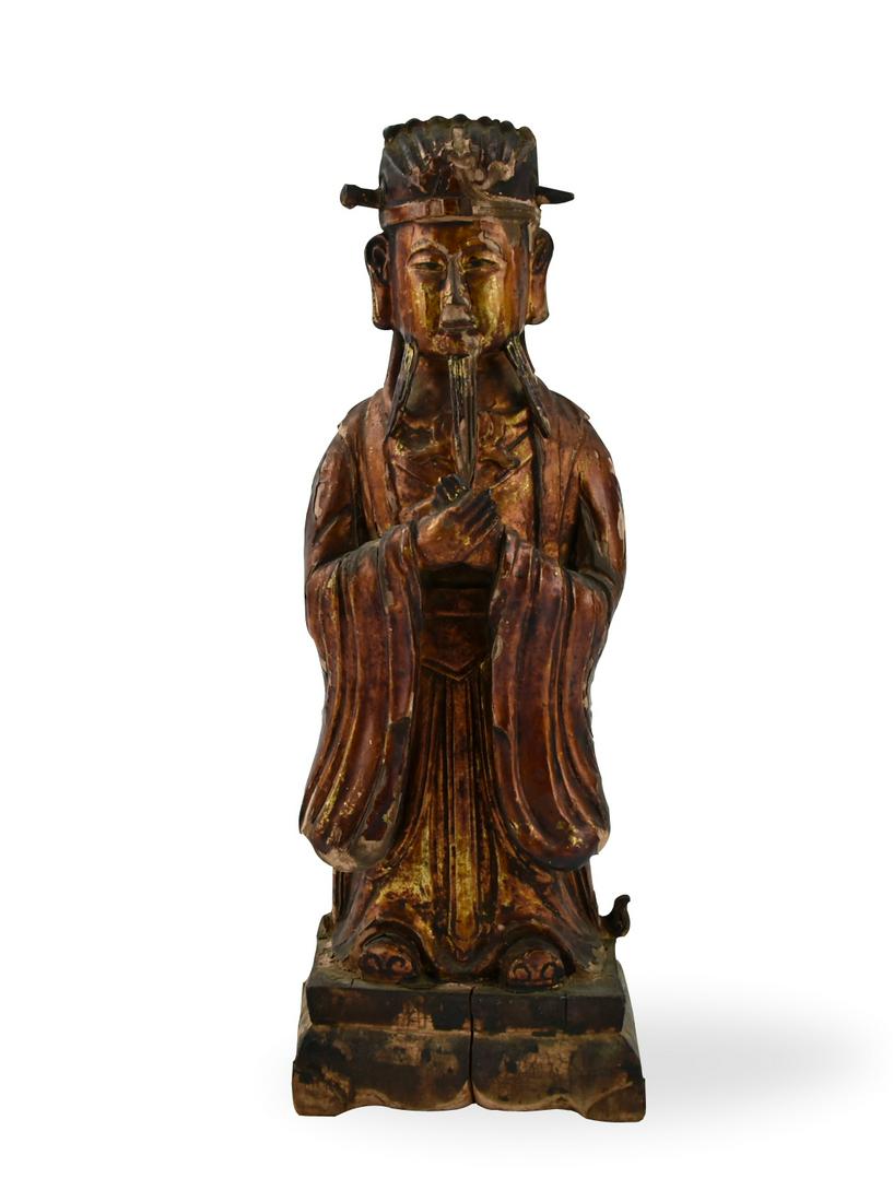 Chinese Lacquered Wooden Deity Figure, Qing D.: Chinese ,Late Qing D, deity with both hands crossed, and elongated ears, wearing billowing robes falling in ample folds over his knees and arms, eyes with a meditative expression with three long beard