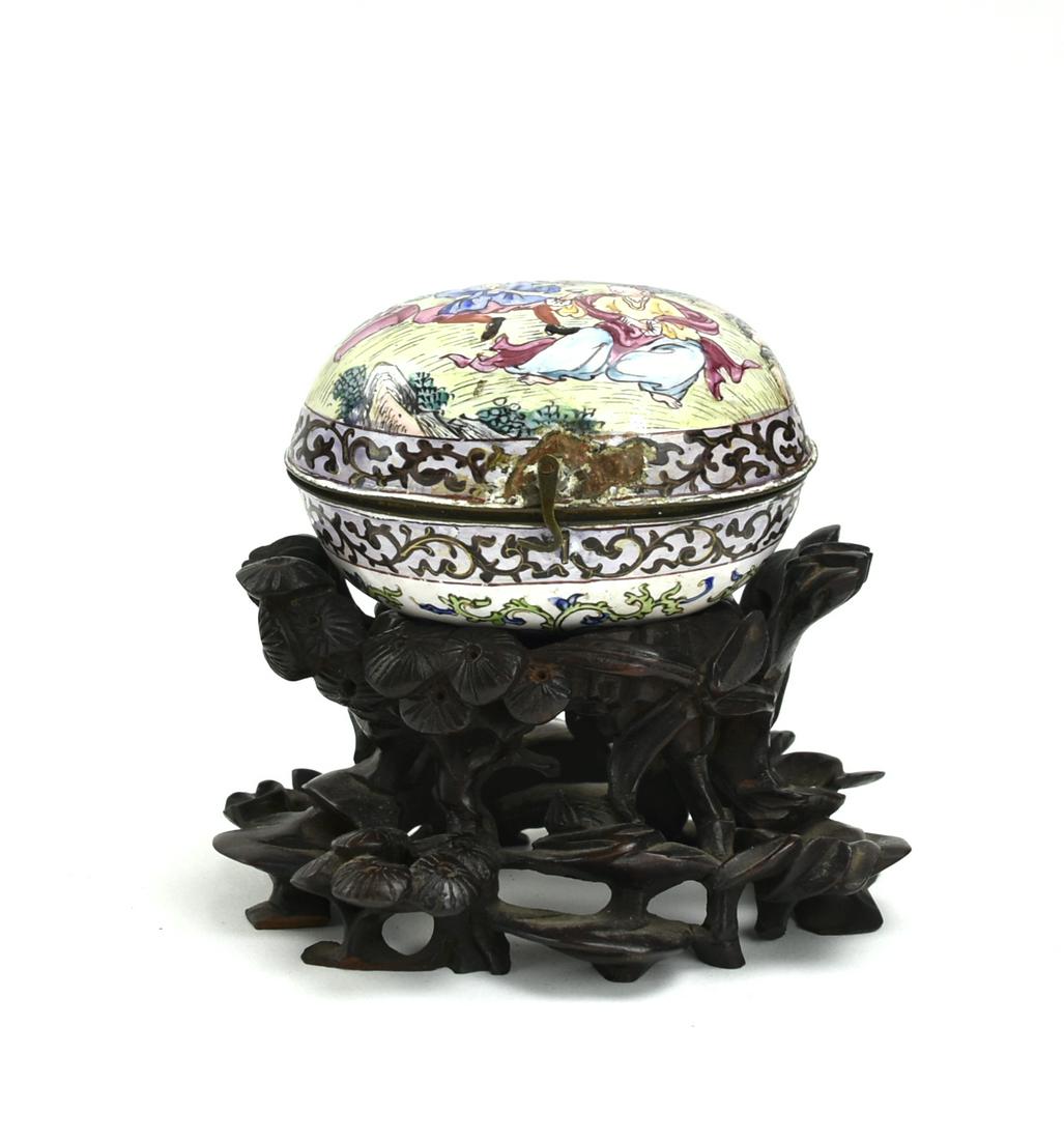 Chinese Canton Enamel Covered Box & Stand, Qing D.: Chinese ,Qing D, in a oval shape, European style decoration on the cover of both side ,one side painted with figures in the garden drinking wine, the other side painted with flower pattern, come with 
