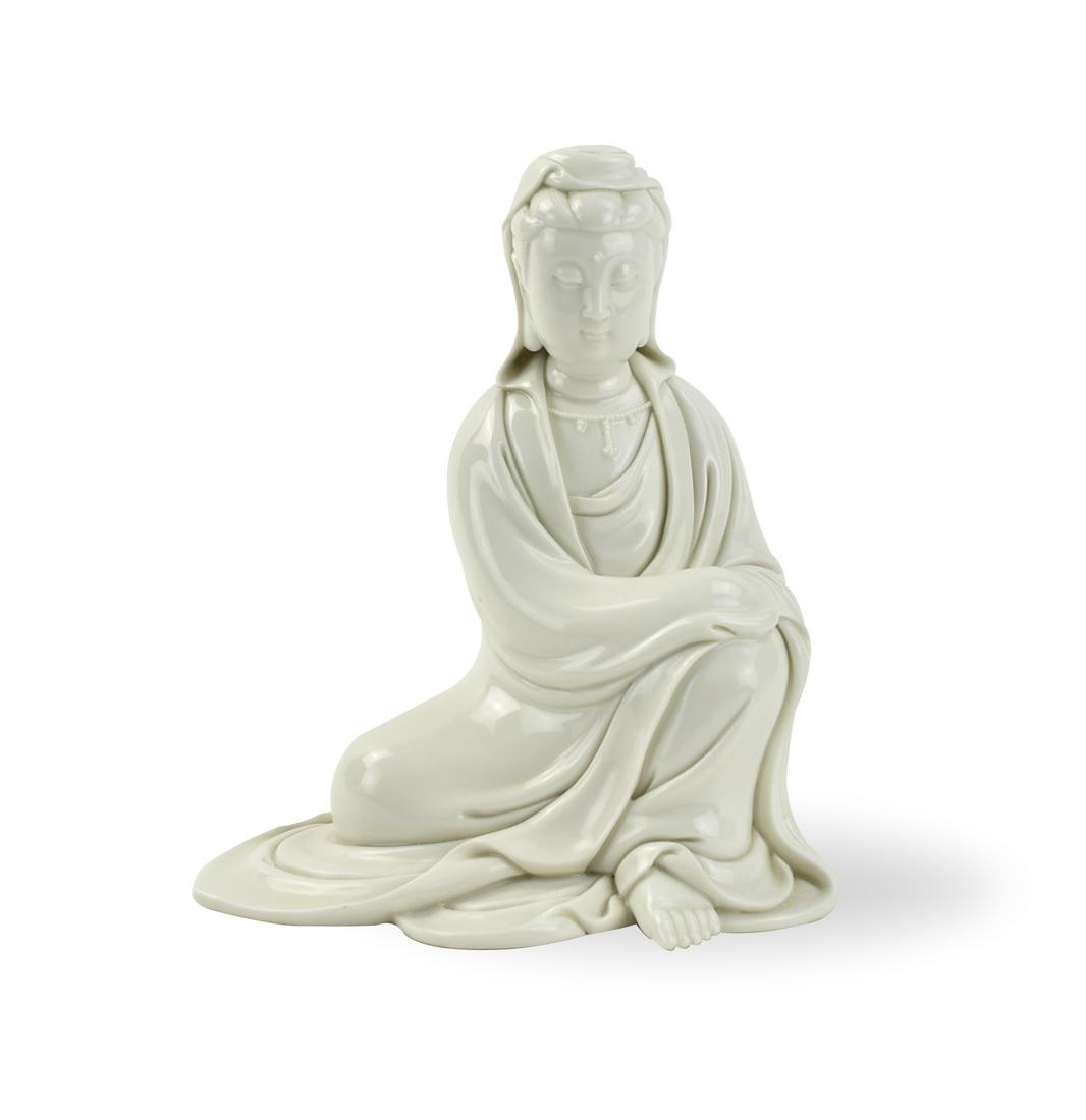 Chinese Blanc De Chine Guanyin Statue,20th C.: Chinese ,20th C,carved, polished, sculpture of a white glazed Guanyin: seated, in flowing robes, with one leg raised, with a meditative countenance H: 7.5"(19cm) D: 6.5"(16.5cm)Condition: in excellent