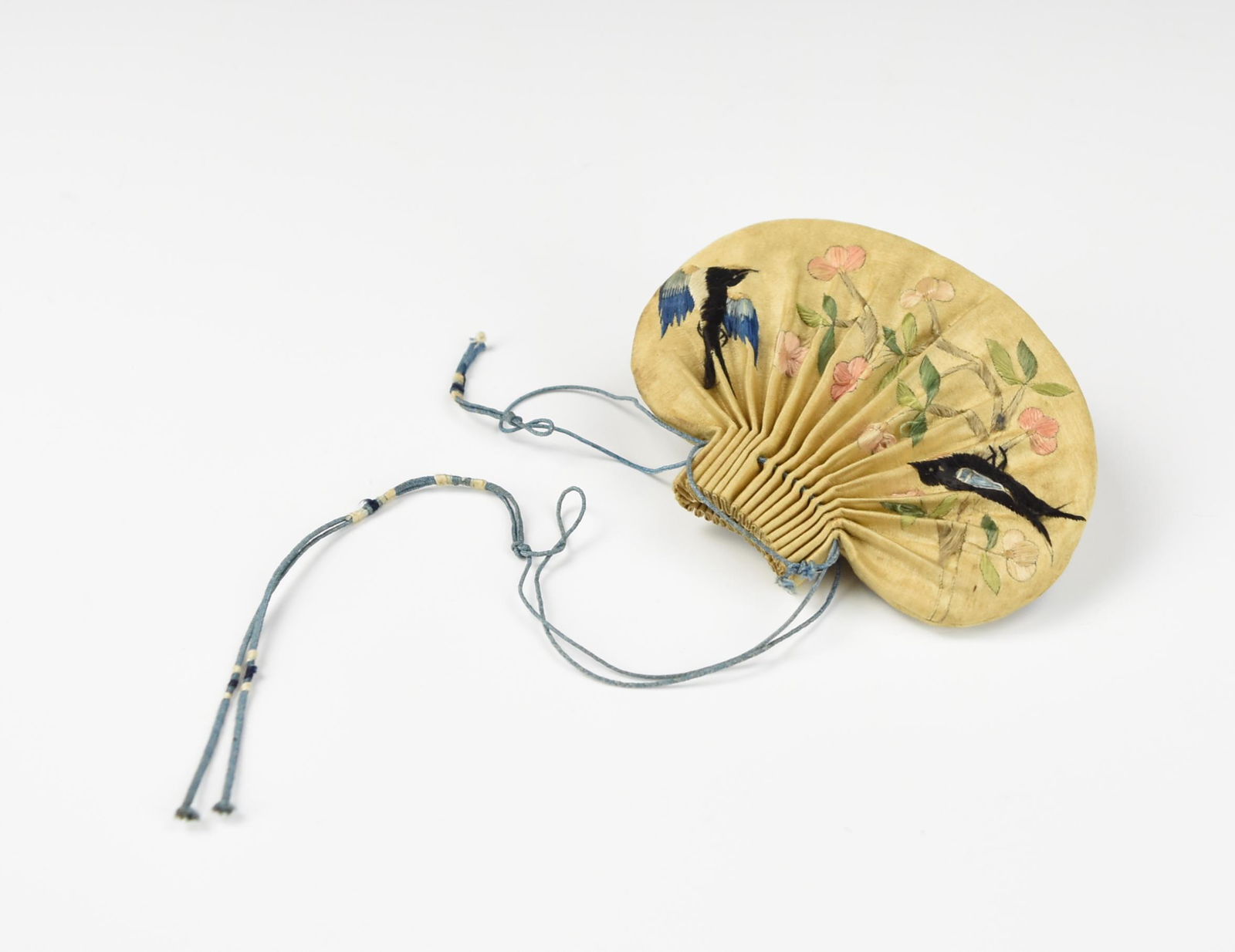 Chinese Antique Sachet ,Qing Dynsty: a Chinese ,late Qing D. a fan shaped sachet ( pocket full of perfume) decorated with stichwork of birds and flower on both side , blue string attach to the mouthD: 4 1/8" (10.5 cm) Condition: in good
