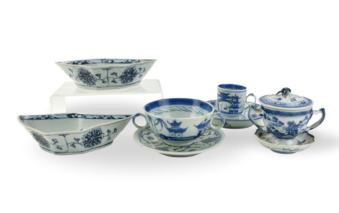 Group of Chinese B&W Saucers, Cups & Dishes,19th C: Chinese ,19th C,each cups, saucers and dishes painted to the center with a shaped cartouche enclosing various flower blossoms and foliage scenes, decorated with butterflies, foliage sprays and outdoor