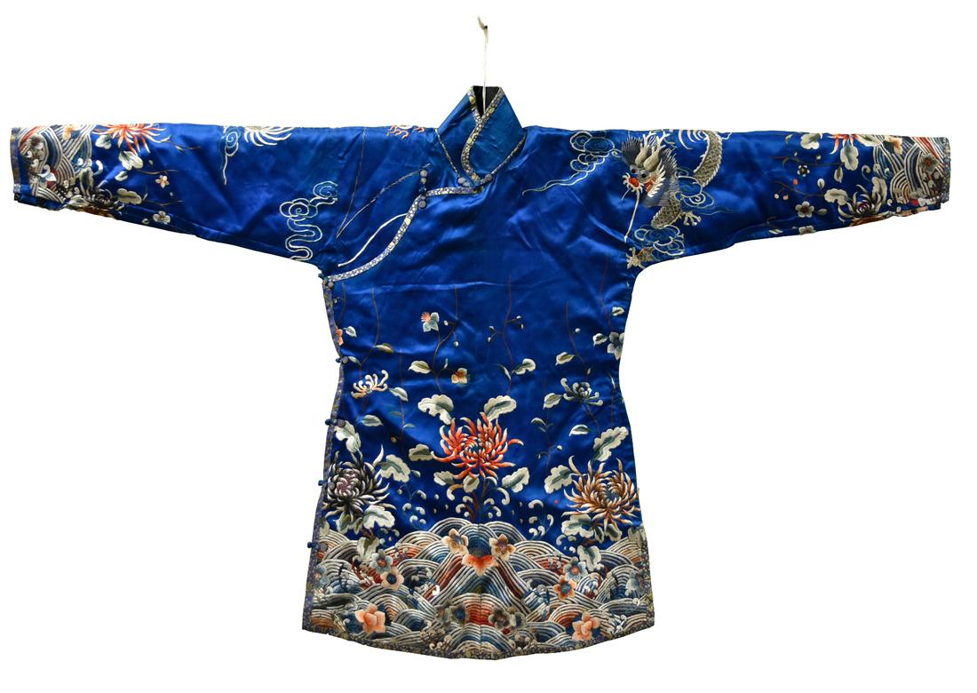 Chinese Embroidery Robe of Child, Qing Dynasty: Chinese ,Qing Dynasty ,with various flowering plants amidst breaking waves on a blue ground with geometric patterned border to the sides H: 29.3"(74.5cm) D: 49.8"(126.5cm) Condition: in good condition