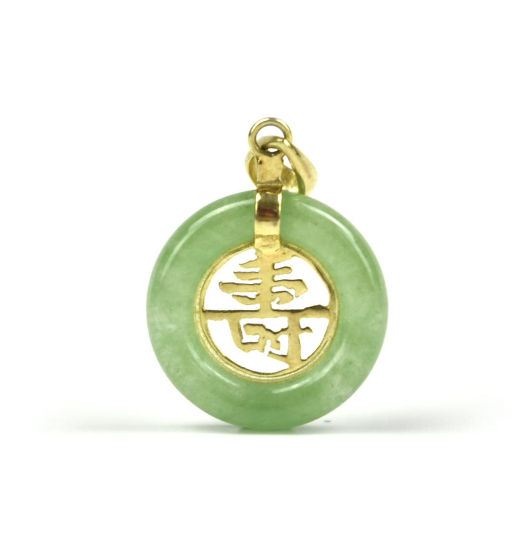 A Jadeite Pendent with Gold "Shou": A Jadeite Pendent with Gold, Shou character carved to the interior, come with certificate D: 0.7"(1.8cm) Condition: in excellent condition, free of damage