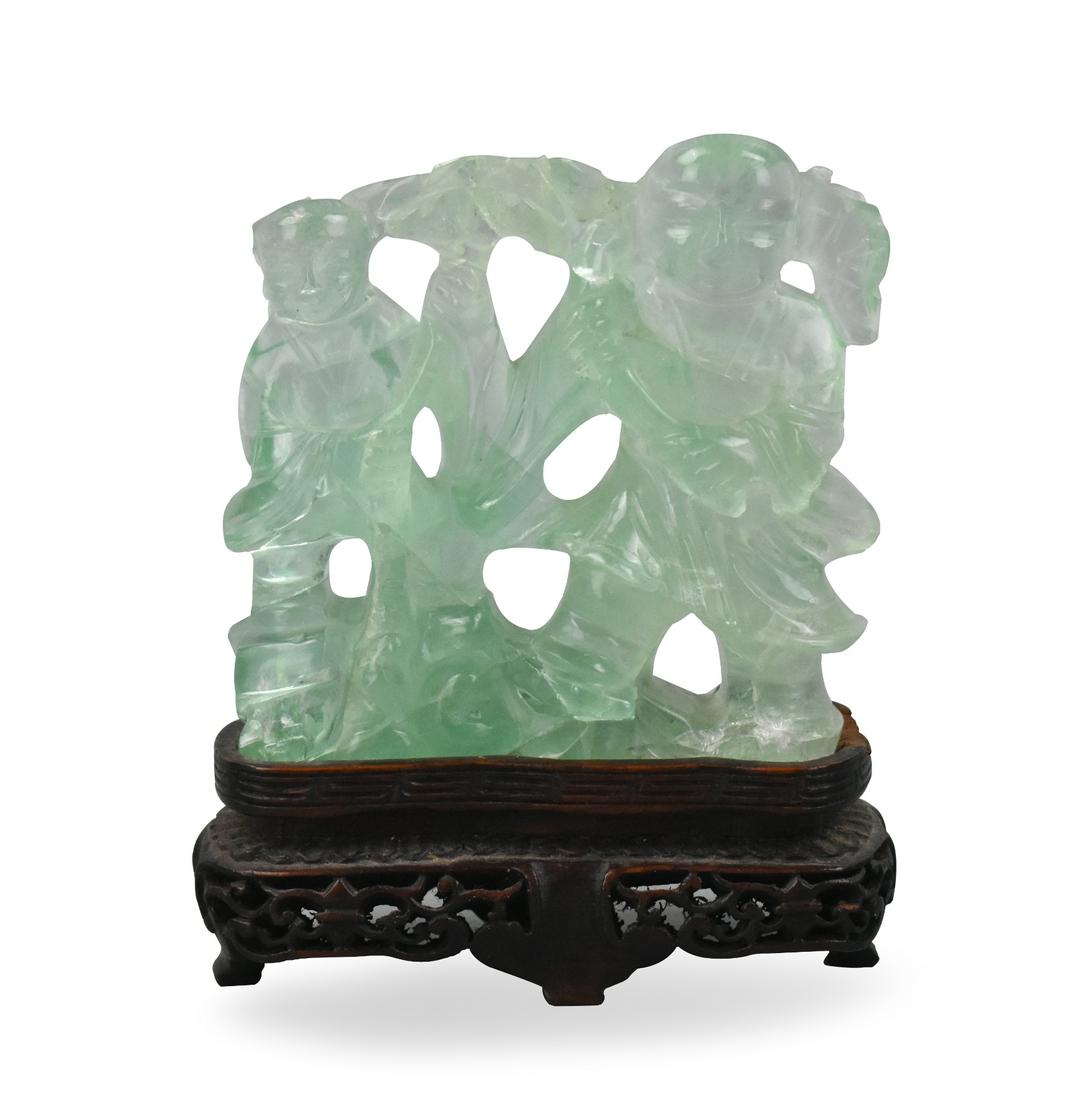 Chinese Fluorite Carved HeHe Figures, QIng Dynasty: A Chinese fluorite carved statue of HeHe figures, dating from the Qing dynasty. These are the two Daoist immortals of union and happiness. They are both standing and smiling, and carved on both sides.