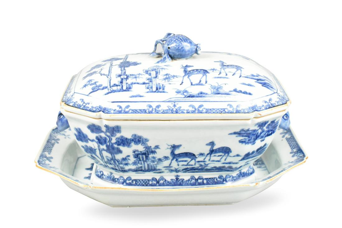 Set of Chinese Blue & White Tureen w/ Deer,18th C.: A three piece, Chinese,18th C, export porcelain soup tureen with cover and dish. The tureen with splayed foot, tapering sides, & animal face handles at either side, the flattened domed lid with pomegr