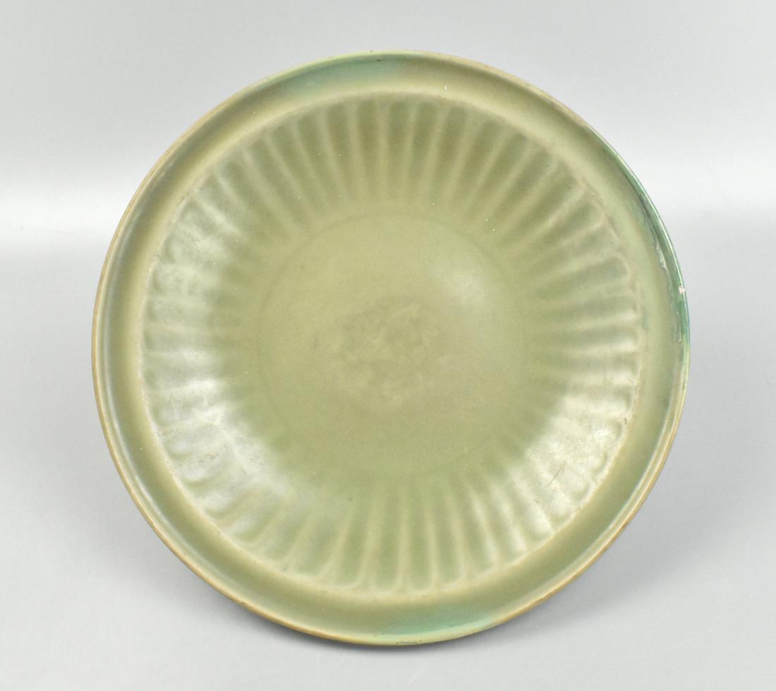 Chinese Celadon Glazed Longquan Plate, Ming D.: A Chinese celadon glazed longquan plate, dating from the Ming dynasty (1368-1644). Bottom of plate is smooth and cheek has shallow incised marks around, the flattens at the turned up rim, with a wide,