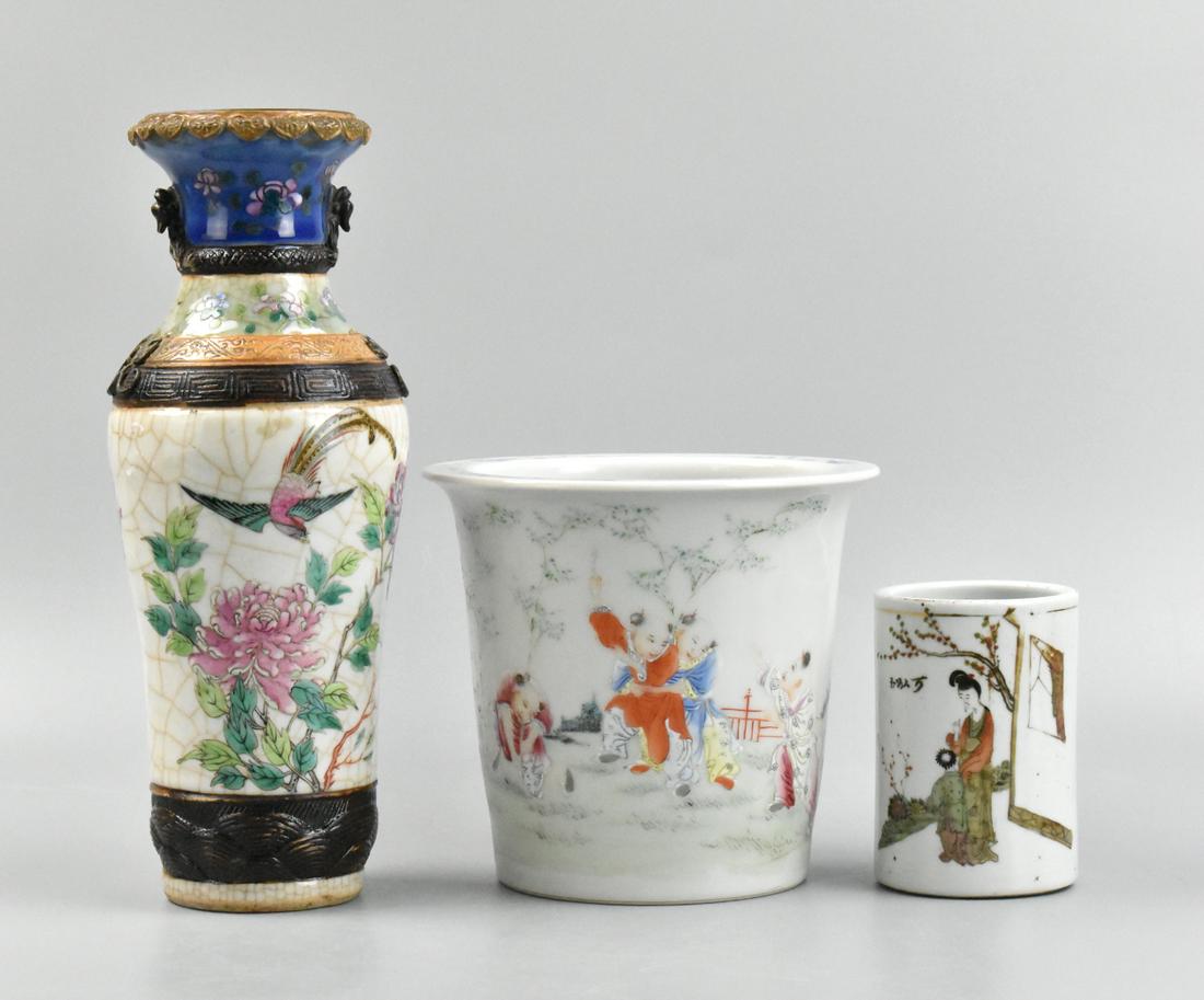 3 Famille Rose Vase, Brushpot & Planter,ROC Period: A group of three items: a famille rose vase, a brush pot, and a planter. The planter has a cylindrical body and expands to a flared rim, with a design of animated boys playing in colorful costumes. Tw